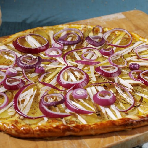 Puff pastry tart with potato, leek and red onion