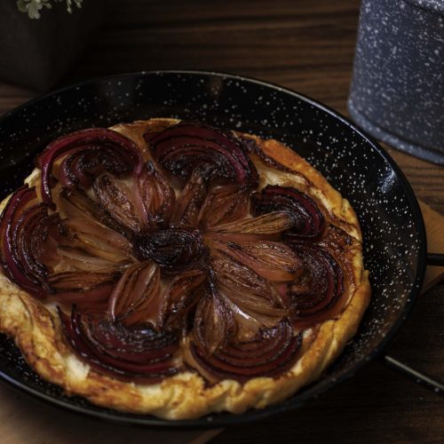 Tarte tatin of shallots and a red onion